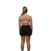 Woman black running shorts rear view 