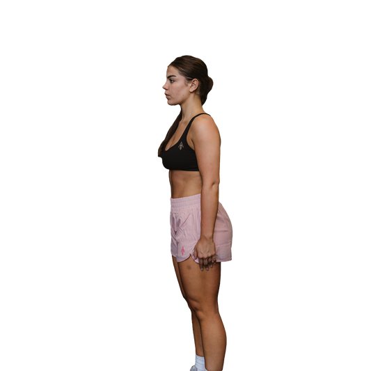 Woman pink running shorts  side view