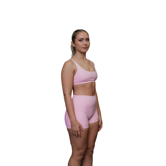 Woman wearing a pink sports bra 