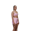 Woman wearing a pink sports bra 