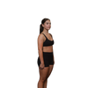 Woman wearing a black sports bra 