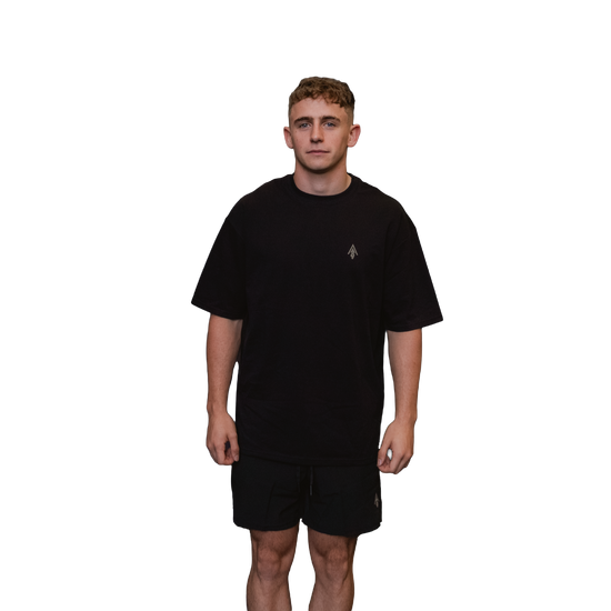 Man wearing relaxed tee unisex black front view