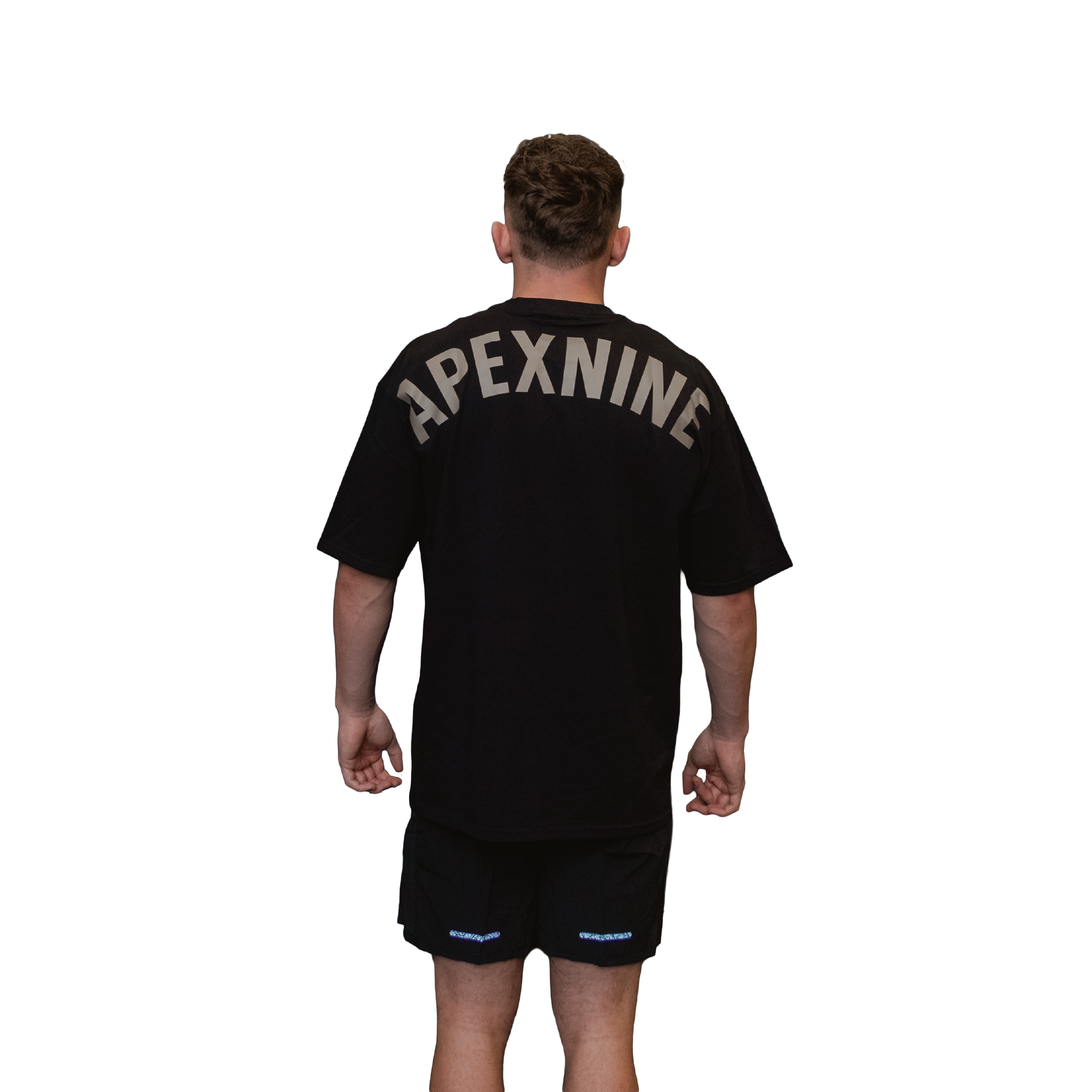 Man wearing relaxed tee unisex black rear view signature APEXNINE