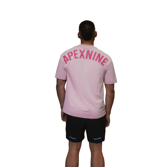 Man wearing relaxed tee unisex pink rear view signature APEXNINE